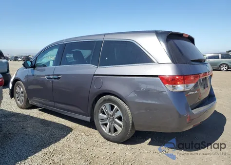 2015 Honda Odyssey Touring z USA, uszkodzony, nr VIN 5FNRL5H95FB072935
